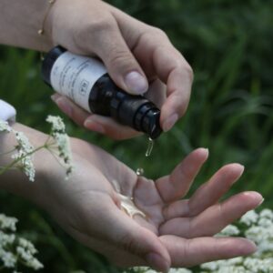 RÅ Skincare correcting serum is pumped in the hand so that you can see the consistency of the product
